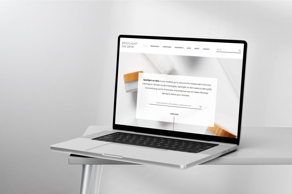 We Are Web Design Portfolio image showcasing the clean, informational website design for skincare knowledge hub Spotlight on Skin on a laptop screen.